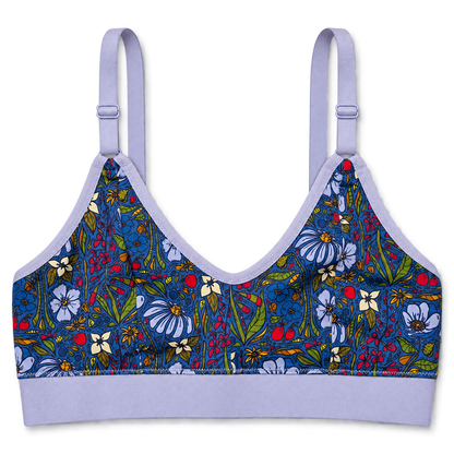 SWOOP wireless bra with a colorful floral and print on the cups and a solid light lavender trim and band, shown against a plain white background.